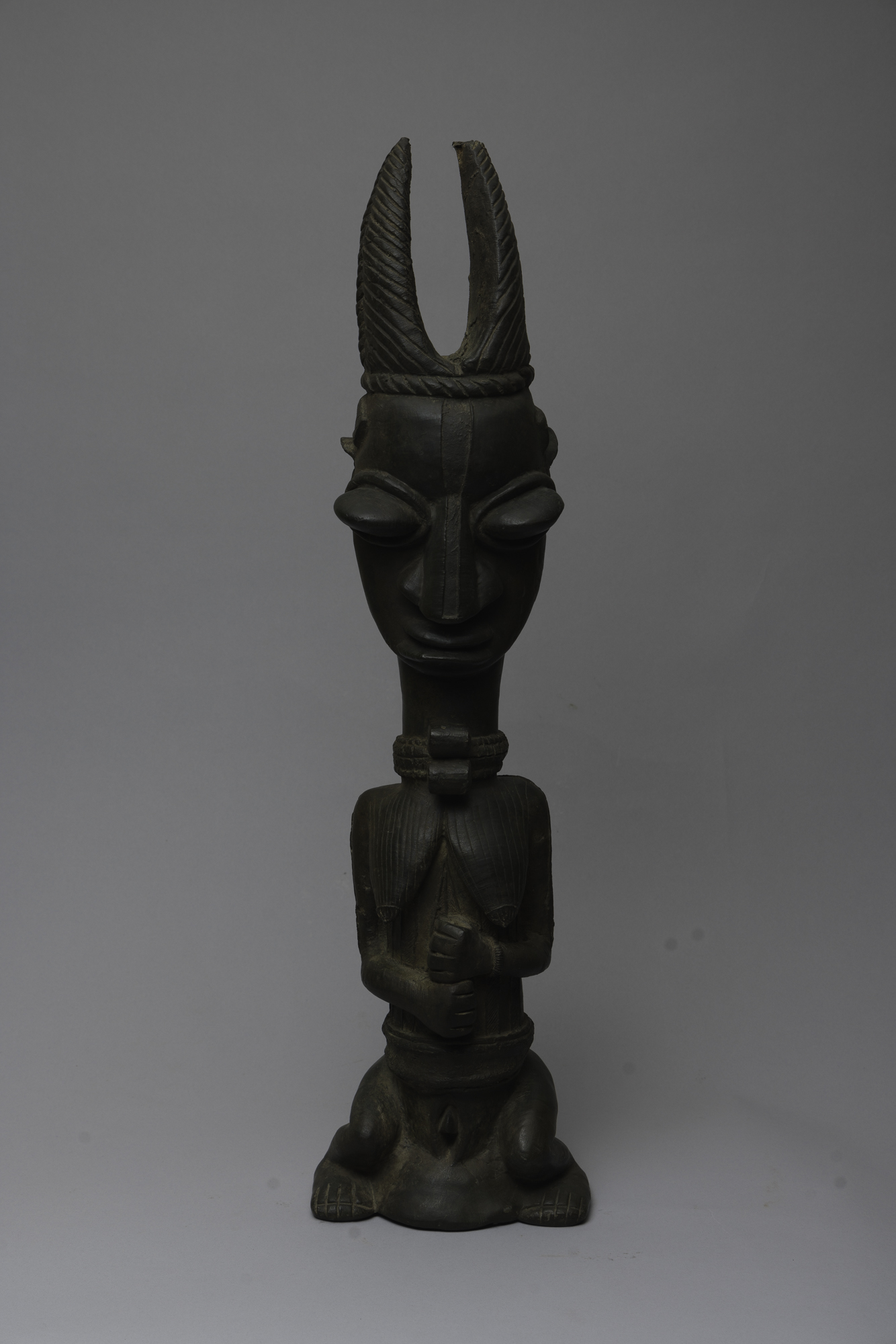 Seated female Ogboni figure